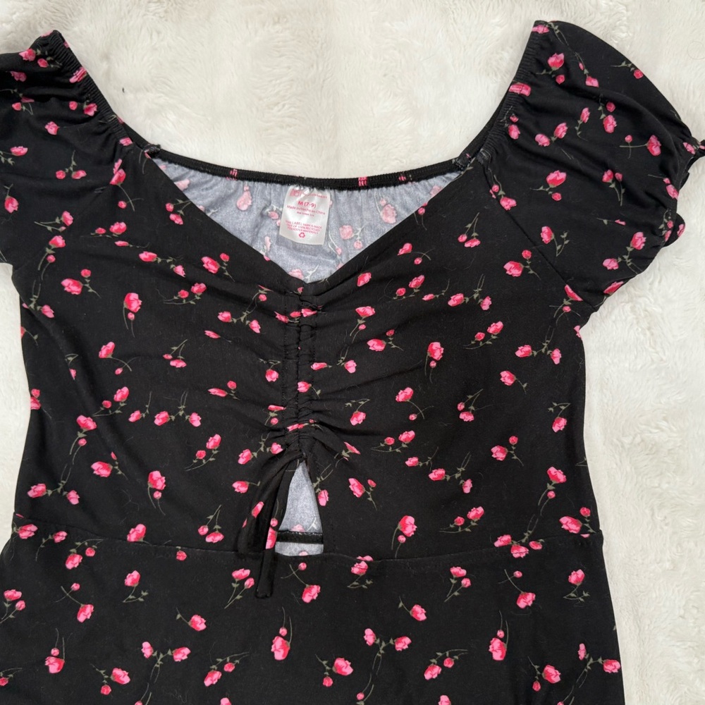 Chic Black Dress with Pink Floral Design